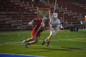 Morgantown High boys’ lacrosse caps perfect regular season with 17-6 victory over University